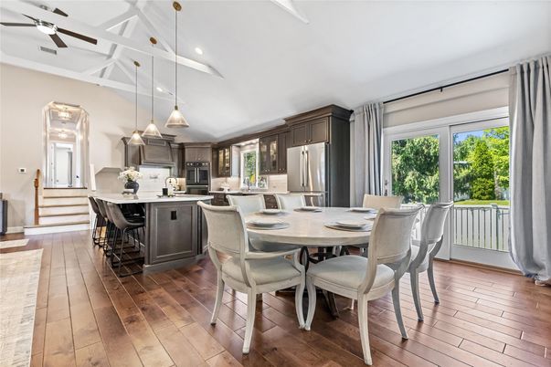 Dining room, Interior, Kitchen, Pendant Lights, Recessed Lighting, Stainless Steel Appliances, Wood Texture Flooring