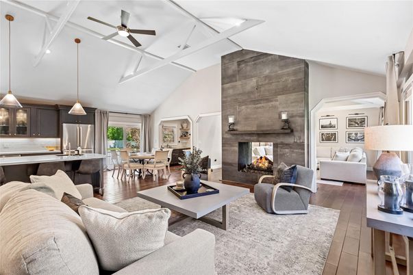 Dining room, Fireplace, Interior, Kitchen, Living room, Pendant Lights, Stainless Steel Appliances, Wood Texture Flooring