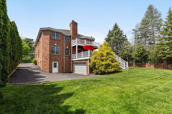 Attached, Backyard, Exterior, Facade, Brick Facade, None