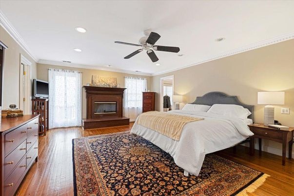 Bedroom, Fireplace, Interior, Recessed Lighting, Wood Texture Flooring