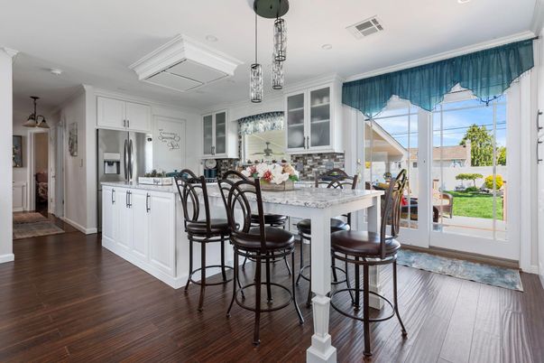 Dining room, Interior, Kitchen, Pendant Lights, Recessed Lighting, Stainless Steel Appliances, Wood Texture Flooring