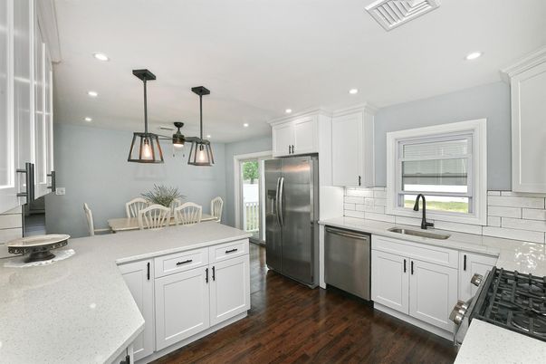 Dining room, Interior, Kitchen, Pendant Lights, Recessed Lighting, Stainless Steel Appliances, Wood Texture Flooring