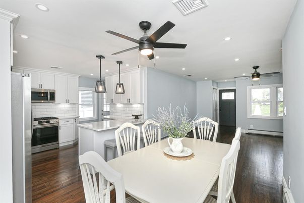 Dining room, Interior, Kitchen, Pendant Lights, Recessed Lighting, Stainless Steel Appliances, Wood Texture Flooring
