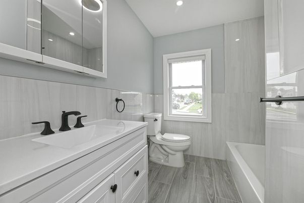 Bathroom, Dual Sink Vanities, Interior, Recessed Lighting, Wood Texture Flooring