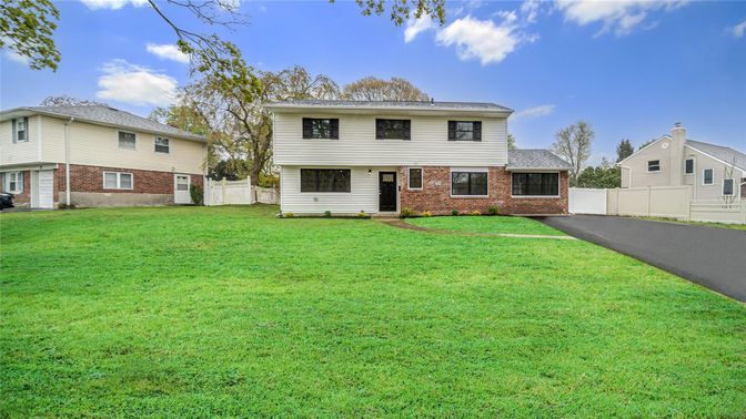 Attached, Backyard, Exterior, Facade, Brick Facade, Split Level