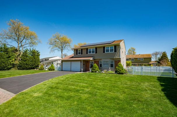 Attached, Backyard, Exterior, Facade, Solar Panels, Split Level