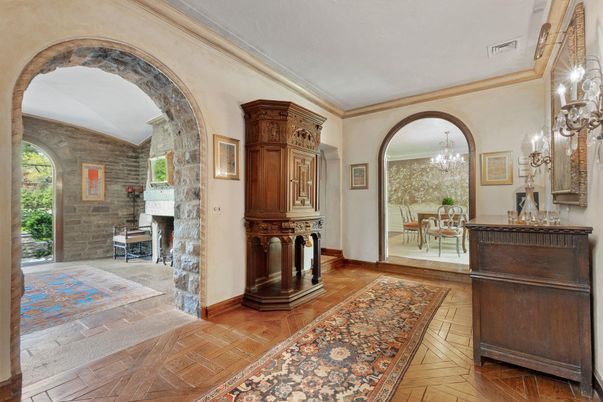 Chandelier, Dining room, Fireplace, Interior, Stone Walls, Wood Texture Flooring