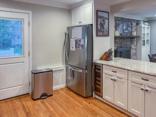Fireplace, Interior, Kitchen, Recessed Lighting, Stone Walls, Washer, Wood Texture Flooring