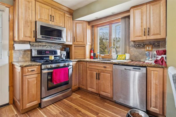 Interior, Kitchen, Recessed Lighting, Stainless Steel Appliances, Wood Texture Flooring