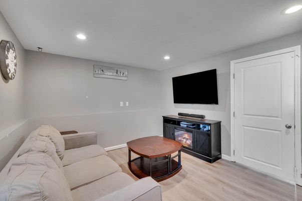 Fireplace, Interior, Living room, Recessed Lighting, Wood Texture Flooring