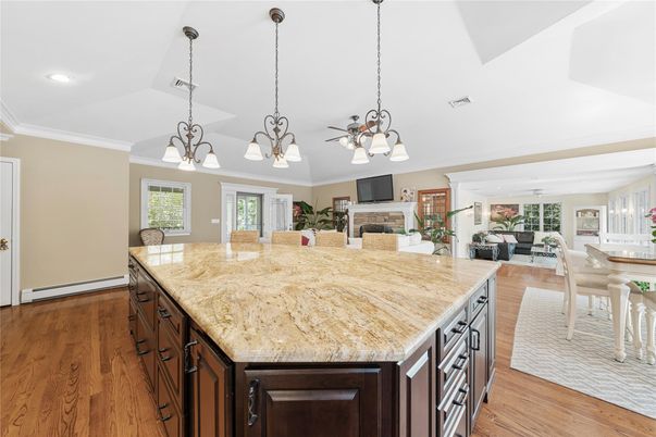 Chandelier, Dining room, Fireplace, Interior, Kitchen, Living room, Pendant Lights, Recessed Lighting, Wood Texture Flooring