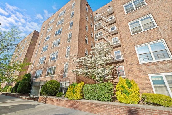 Exterior, Facade, Brick Facade, Condo Building