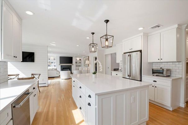 Fireplace, Interior, Kitchen, Living room, Pendant Lights, Recessed Lighting, Stainless Steel Appliances, Wood Texture Flooring