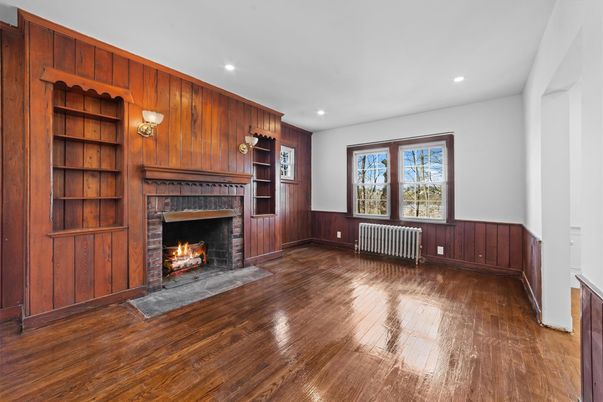 Empty room, Fireplace, Interior, Recessed Lighting, Wood Texture Flooring, Wooden Walls