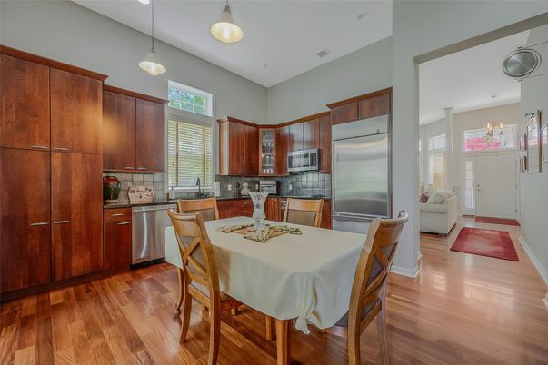 Dining room, Interior, Kitchen, Pendant Lights, Stainless Steel Appliances, Wood Texture Flooring