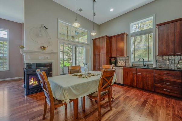 Dining room, Fireplace, Interior, Kitchen, Pendant Lights, Recessed Lighting, Wood Texture Flooring