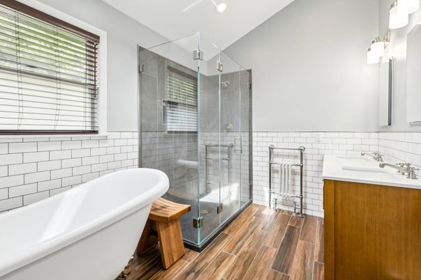 Bathroom, Free Standing Baths, Glass Shower, Interior, Recessed Lighting, Wood Texture Flooring