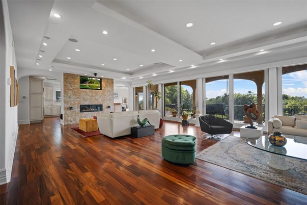Fireplace, Interior, Living room, Recessed Lighting, Stone Walls, Wood Texture Flooring