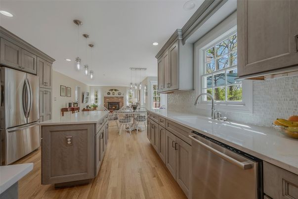 Dining room, Fireplace, Interior, Kitchen, Pendant Lights, Recessed Lighting, Stainless Steel Appliances, Wood Texture Flooring