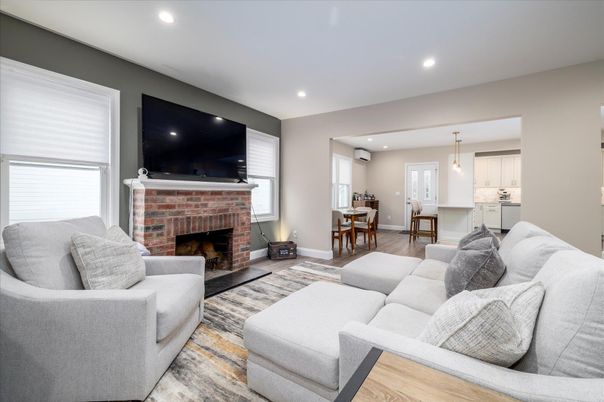 Dining room, Fireplace, Interior, Living room, Pendant Lights, Recessed Lighting, Wood Texture Flooring