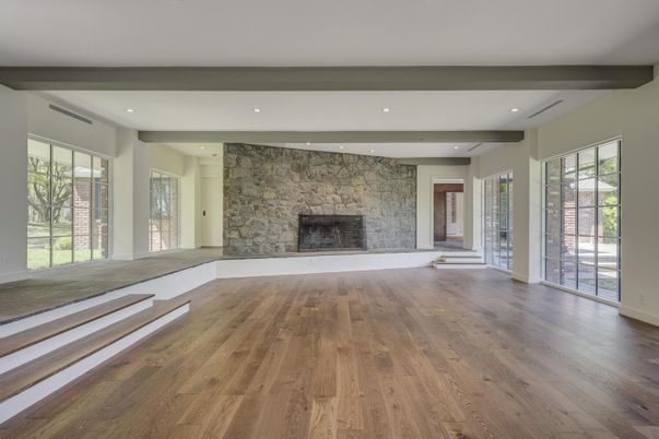 Empty room, Fireplace, Interior, Recessed Lighting, Stone Walls, Wooden Beams, Wood Texture Flooring