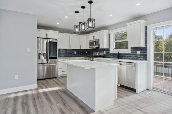 Interior, Kitchen, Pendant Lights, Recessed Lighting, Stainless Steel Appliances, Wood Texture Flooring