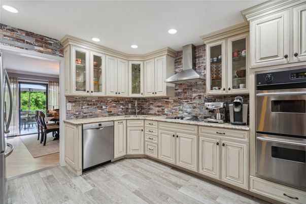 Dining room, Interior, Kitchen, Recessed Lighting, Stainless Steel Appliances, Wood Texture Flooring