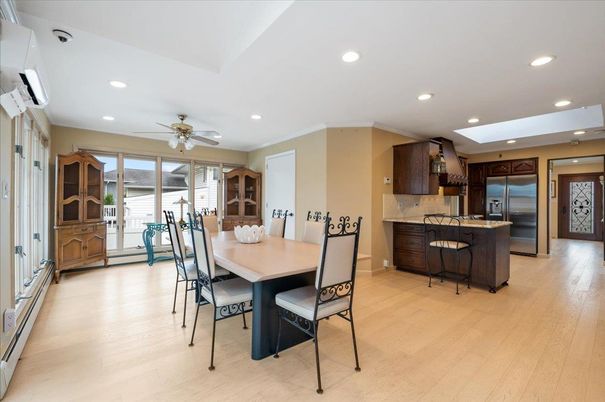 Dining room, Interior, Kitchen, Recessed Lighting, Stainless Steel Appliances, Wood Texture Flooring