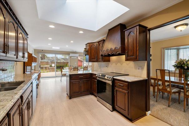 Dining room, Interior, Kitchen, Recessed Lighting, Stainless Steel Appliances, Wood Texture Flooring