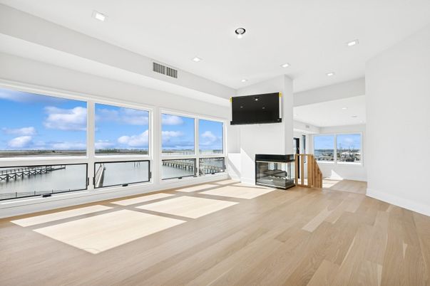 Empty room, Fireplace, Interior, Recessed Lighting, Water, Wood Texture Flooring