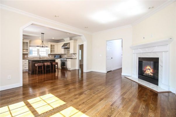 Dining room, Fireplace, Interior, Kitchen, Pendant Lights, Recessed Lighting, Stainless Steel Appliances, Wood Texture Flooring