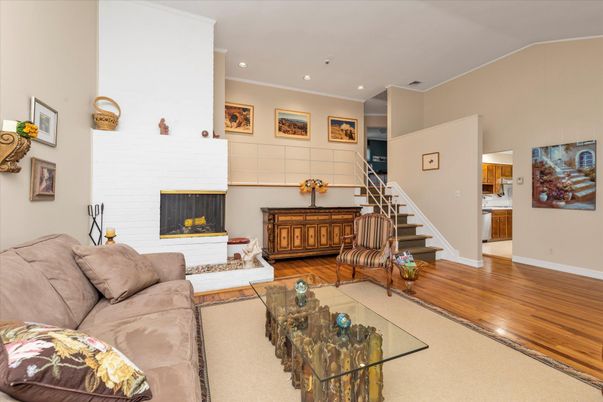 Fireplace, Interior, Living room, Recessed Lighting, Wood Texture Flooring