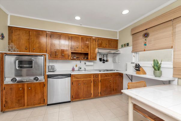Interior, Kitchen, Recessed Lighting, Stainless Steel Appliances, Tile Countertops