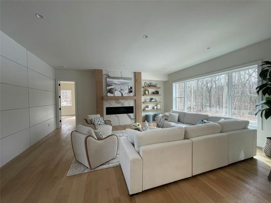 Fireplace, Interior, Living room, Recessed Lighting, Wood Texture Flooring