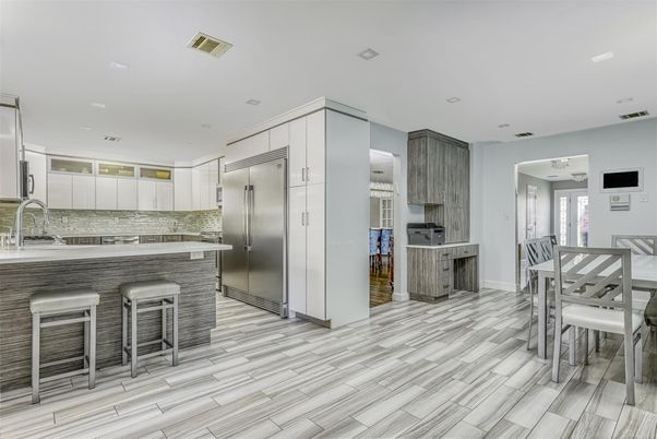Dining room, Interior, Kitchen, Recessed Lighting, Stainless Steel Appliances, Wood Texture Flooring
