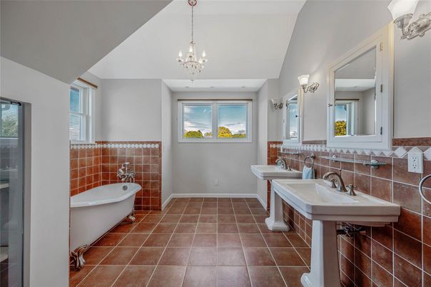 Bathroom, Chandelier, Dual Sink Vanities, Free Standing Baths, Interior, Pendant Lights