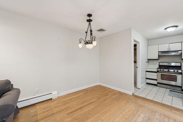 Interior, Kitchen, Pendant Lights, Stainless Steel Appliances, Wood Texture Flooring