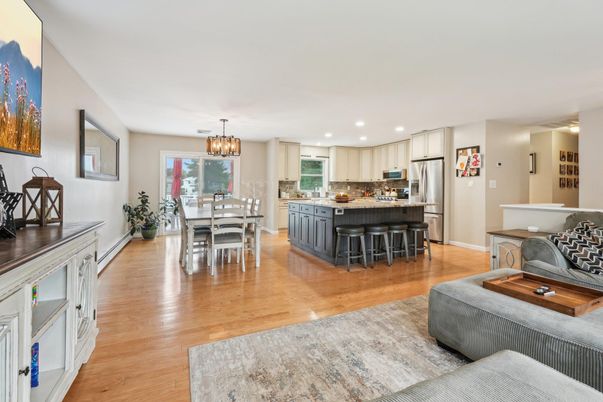 Chandelier, Dining room, Interior, Kitchen, Pendant Lights, Recessed Lighting, Stainless Steel Appliances, Wood Texture Flooring
