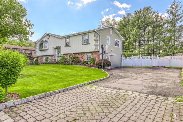 Exterior, Facade, Brick Facade, Raised Ranch