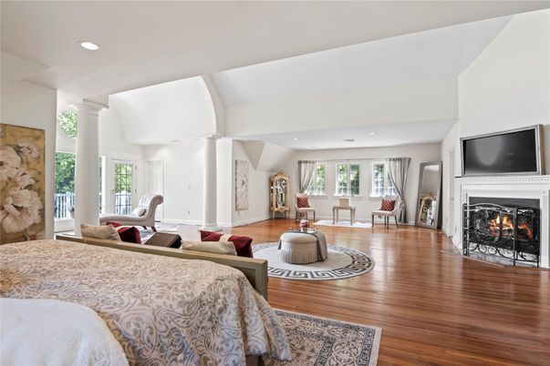 Bedroom, Fireplace, Interior, Living room, Recessed Lighting, Wood Texture Flooring