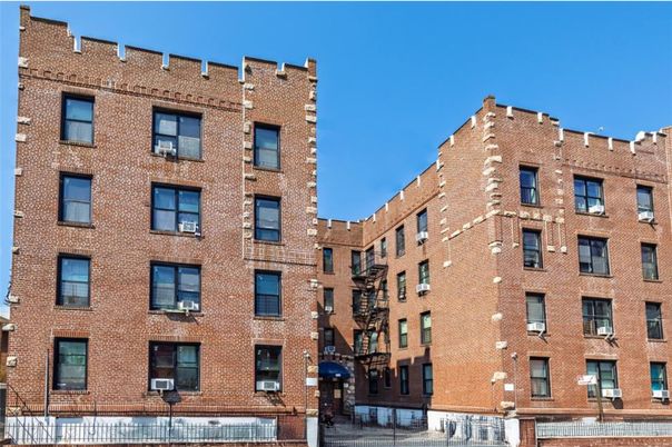 Exterior, Facade, Brick Facade, Condo Building