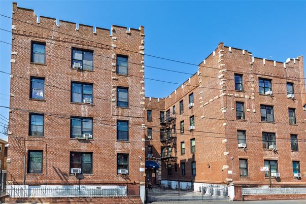 Exterior, Facade, Brick Facade, Condo Building
