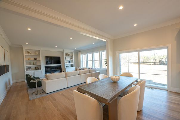 Dining room, Fireplace, Interior, Living room, Recessed Lighting, Wood Texture Flooring