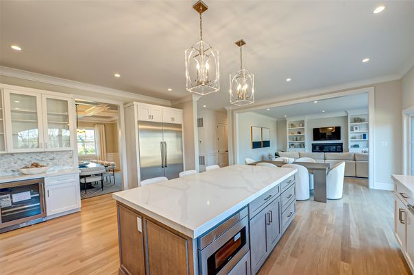 Dining room, Fireplace, Interior, Kitchen, Living room, Pendant Lights, Recessed Lighting, Stainless Steel Appliances, Wood Texture Flooring
