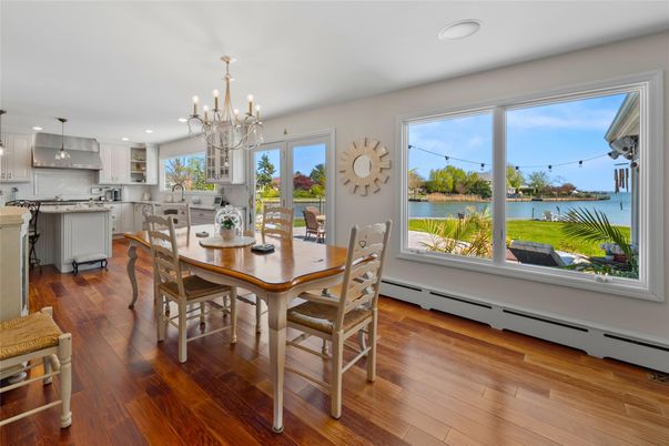 Chandelier, Dining room, Interior, Kitchen, Pendant Lights, Recessed Lighting, Water, Wood Texture Flooring