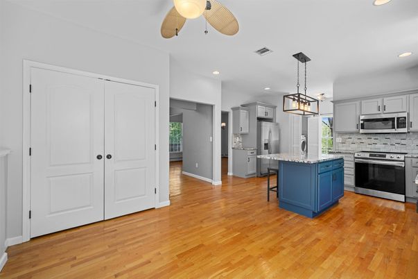 Interior, Kitchen, Pendant Lights, Recessed Lighting, Stainless Steel Appliances, Wood Texture Flooring