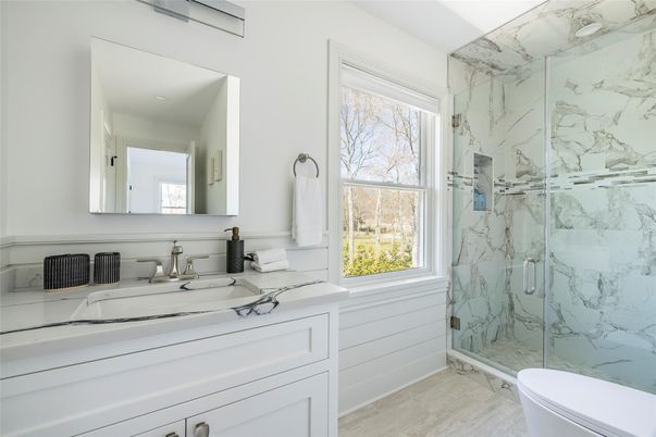 Bathroom, Glass Shower, Interior, Marble Walls, Wood Texture Flooring