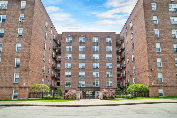 Exterior, Facade, Brick Facade, Condo Building