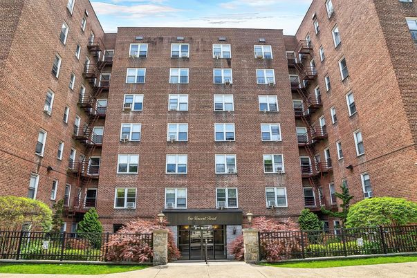 Exterior, Facade, Brick Facade, Condo Building