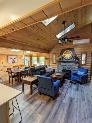 Dining room, Fireplace, Interior, Living room, Pendant Lights, Stone Walls, Wooden Beams, Wooden Ceilings, Wood Texture Flooring, Wooden Walls